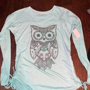 Blue long sleeve shirt with a owl on the front